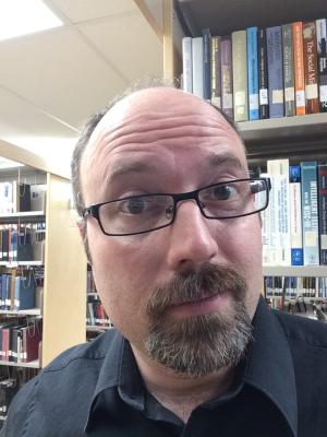 Matt Thomas in Laurier Library stacks from 2017-05-25.