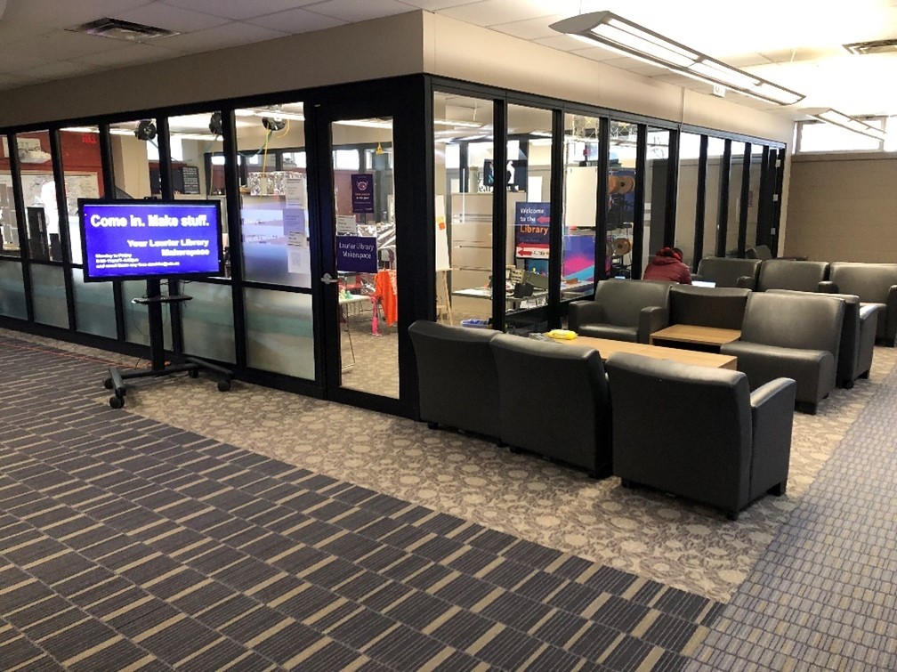 Then exterior of the library maker space. The makerspace is a large room enclosed with glass walls and often has music playing in the background