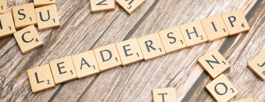 Scrabble tiles spell out LEADERSHIP