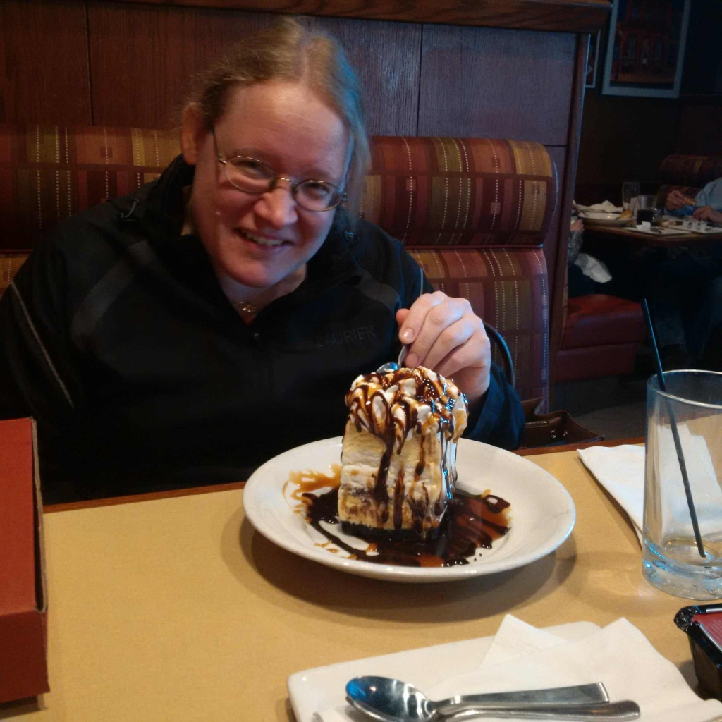 Irene eating a Boston Creme Piescrapper