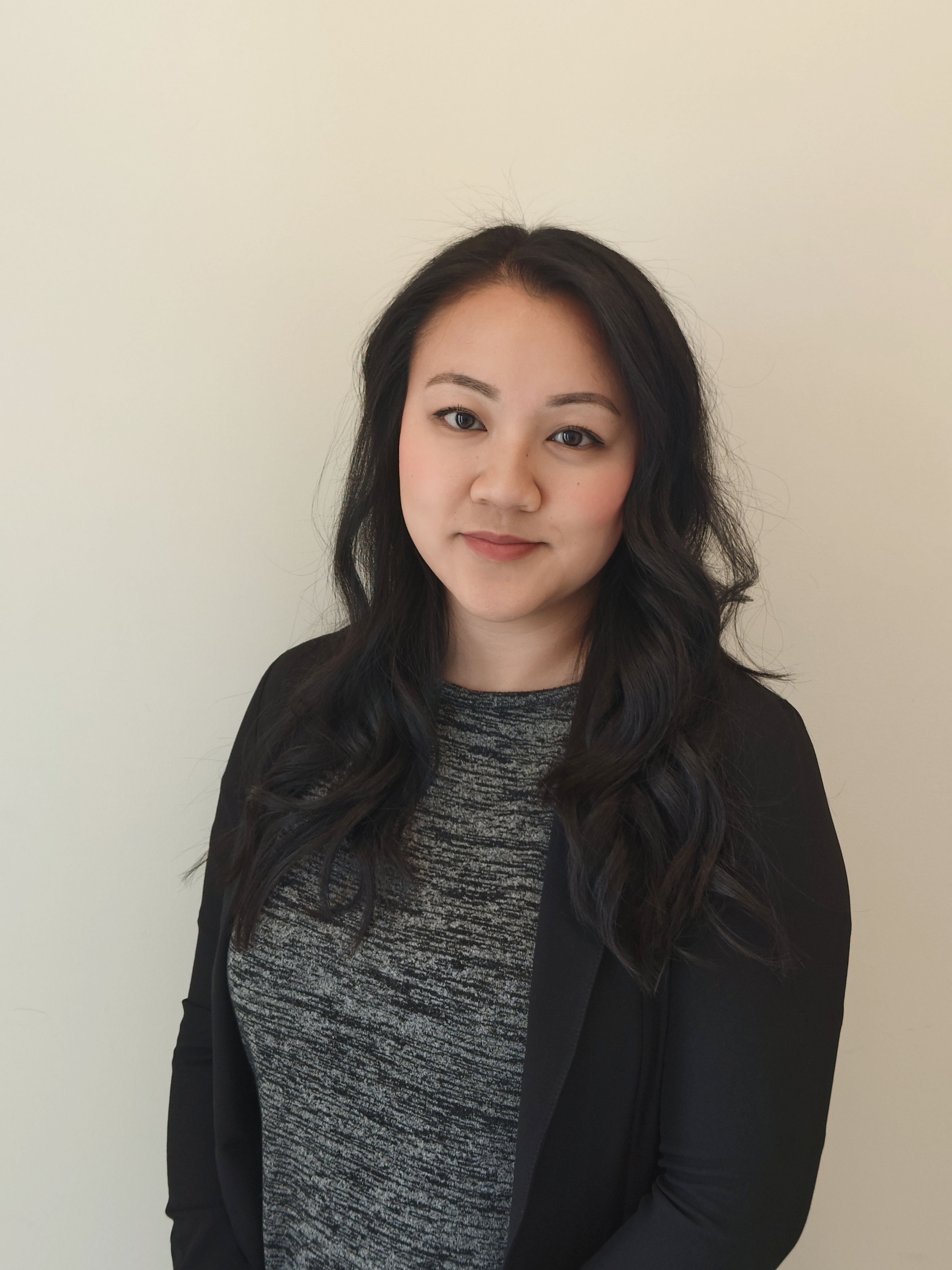 Linda Sam, an east-asian female